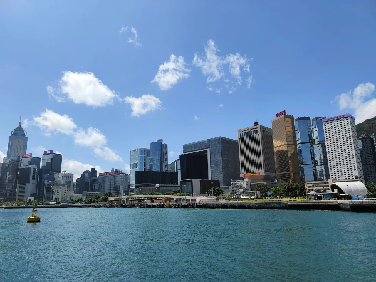 Victoria Harbour and Admiralty, Hong Kong, in bright daylight